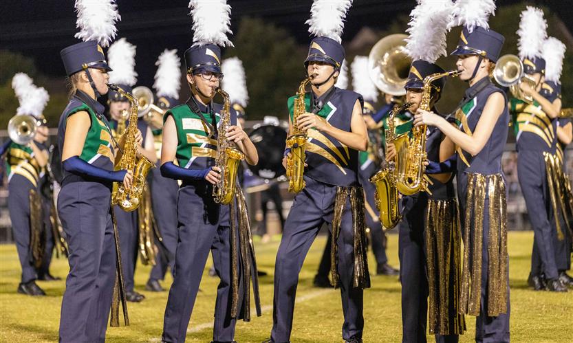 Bands perform on football field
